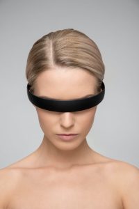 topless woman wearing black headband