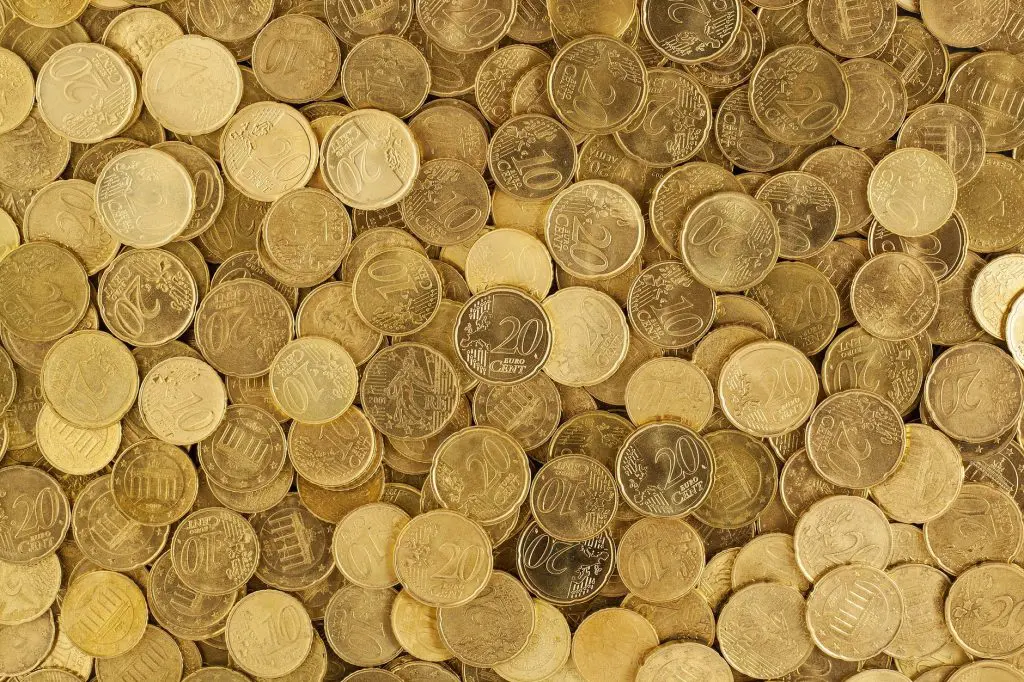 pile of gold round coins