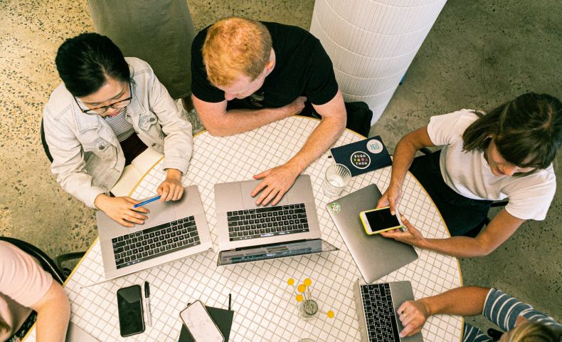 photo of people using laptops