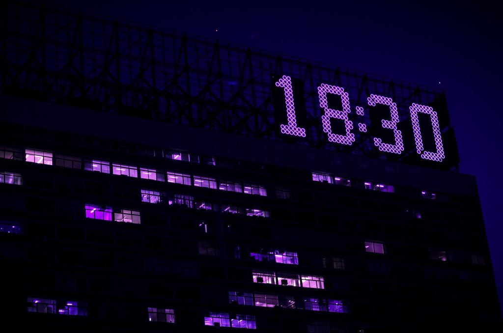 time displayed on top of a building