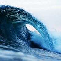 photography of barrel wave