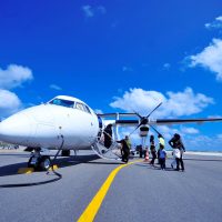 white jet on black tarmac