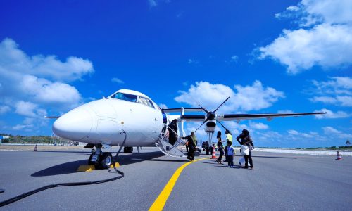white jet on black tarmac
