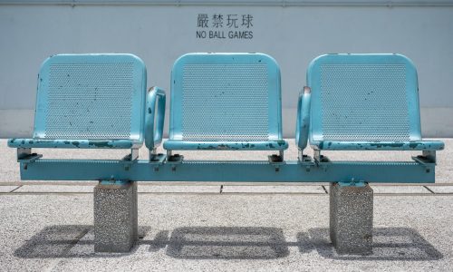 vacant blue armchairs